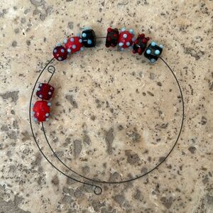 Glass bead necklace on flexible wire